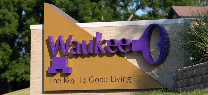 Welcome sign for the city of Waukee, Iowa, featuring the tagline "The Key to Good Living"